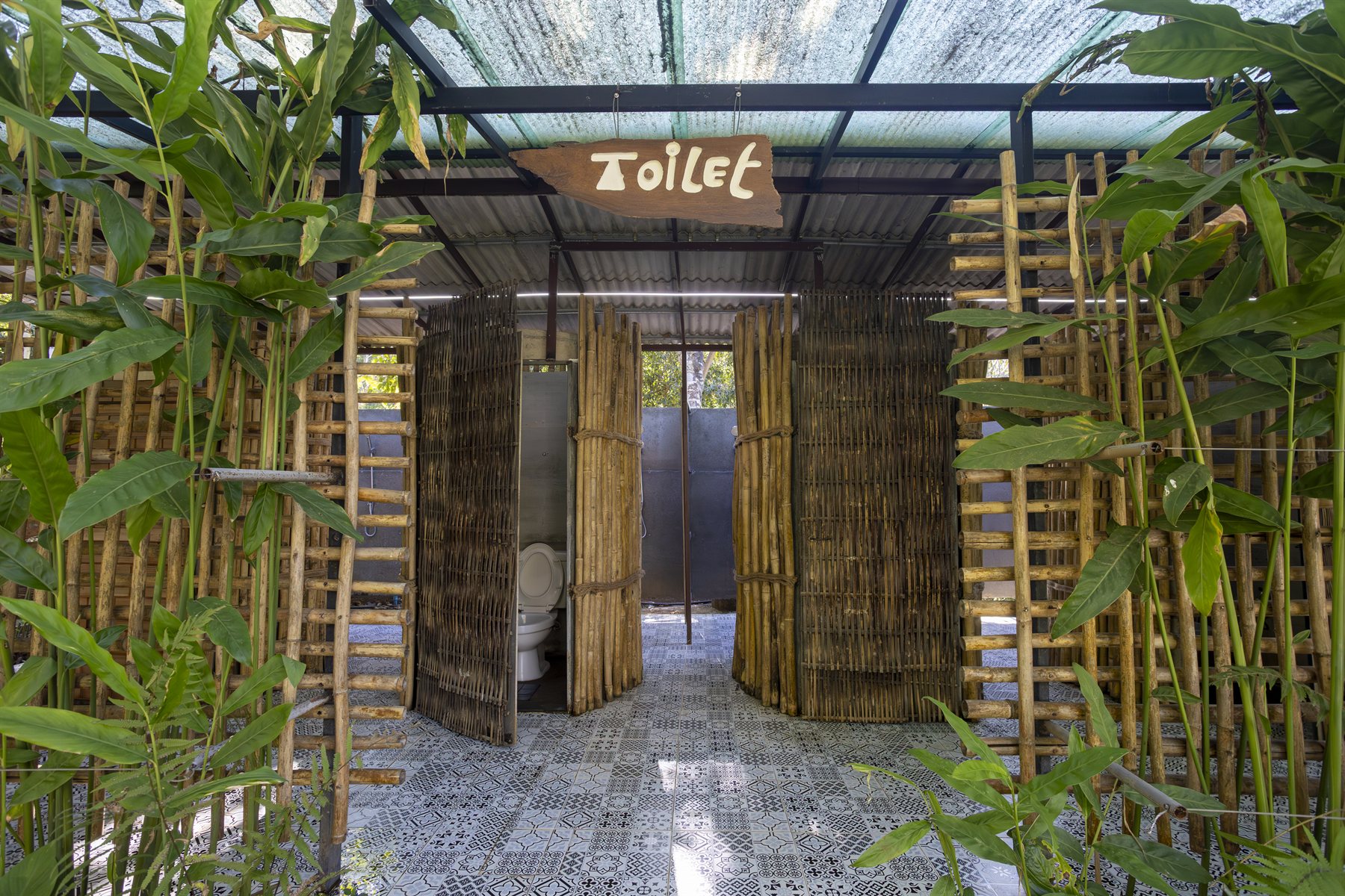 Clean bamboo toilet facilities at the Tubing Chiang Mai base camp
