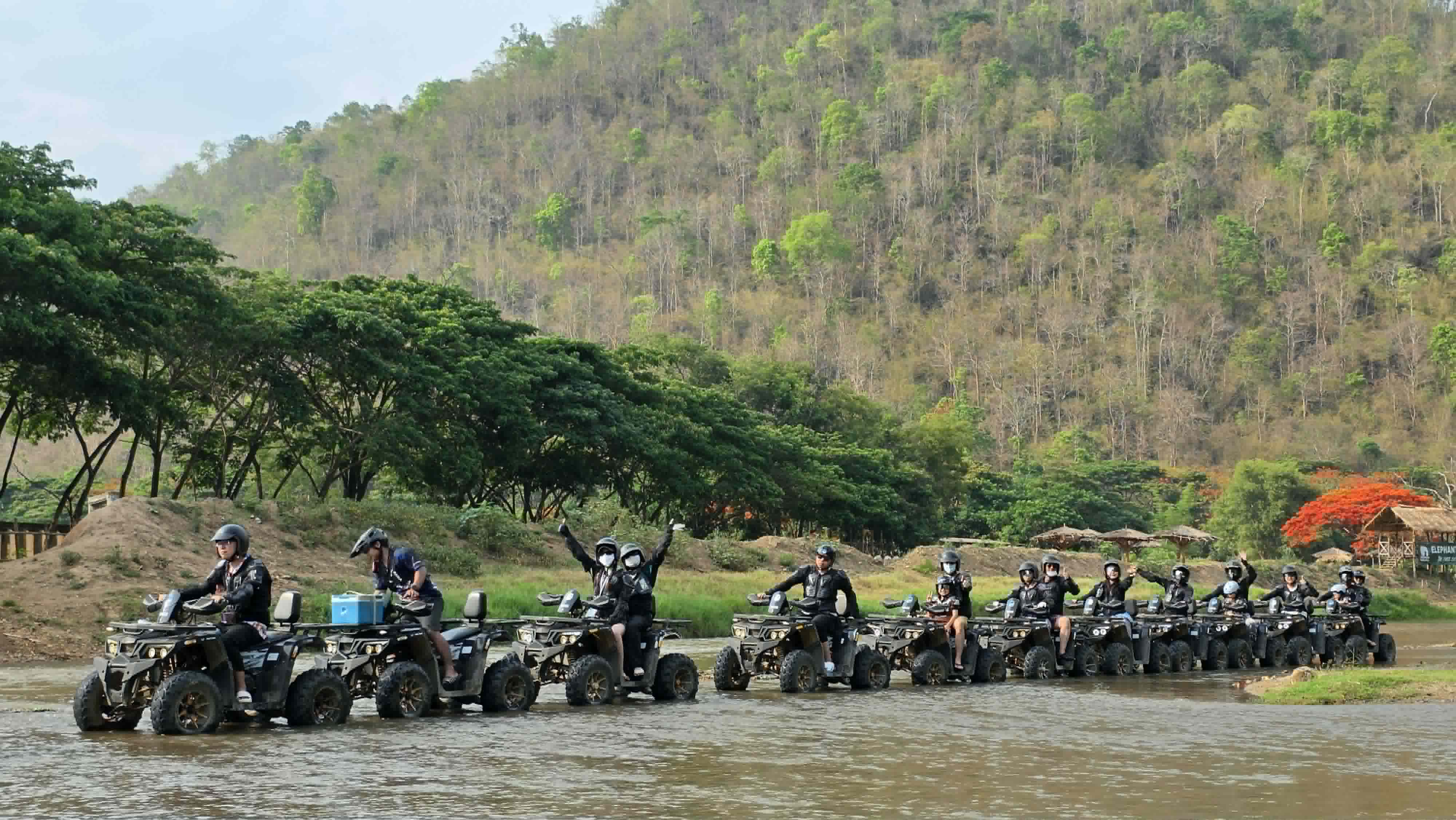 ATV group crossing the Mae Taeng river in Mae Taeng, Chiang Mai