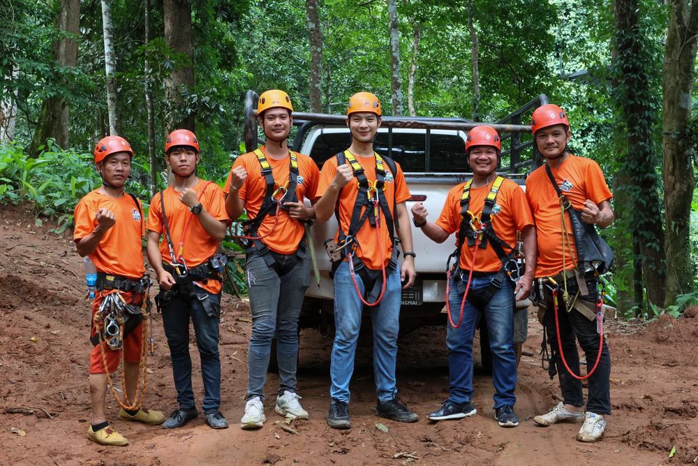 Zipline crew with helmets and full safety harnesses