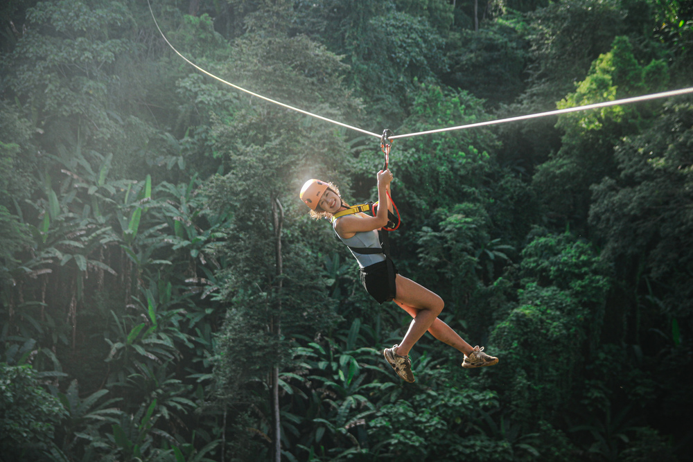 Ziplining through the rainforest canopy in Mae Taeng