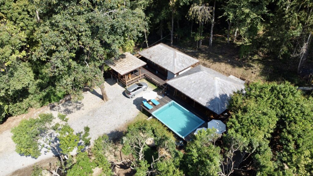 Drone view over the whole villa compound and pool