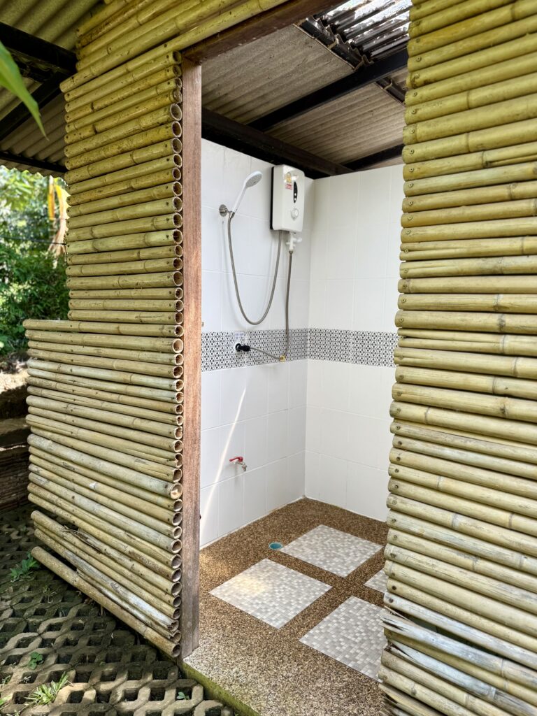 Camp shower room with electric hot-water heater, 30 m from the dorm