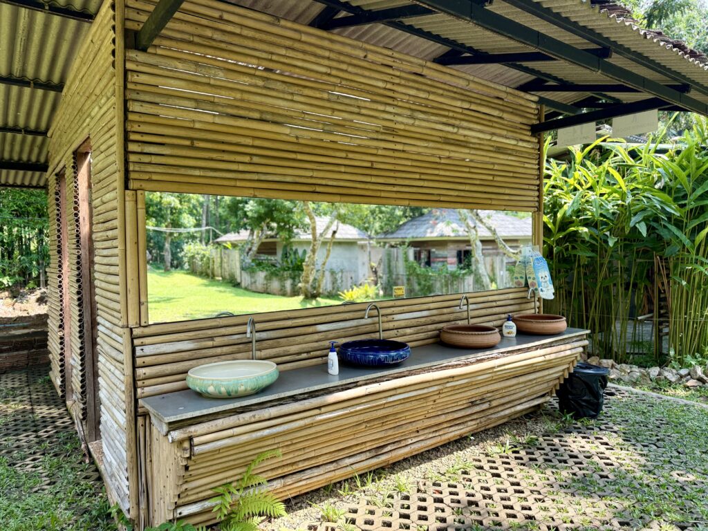 Open-air washbasin pavilion at the base camp