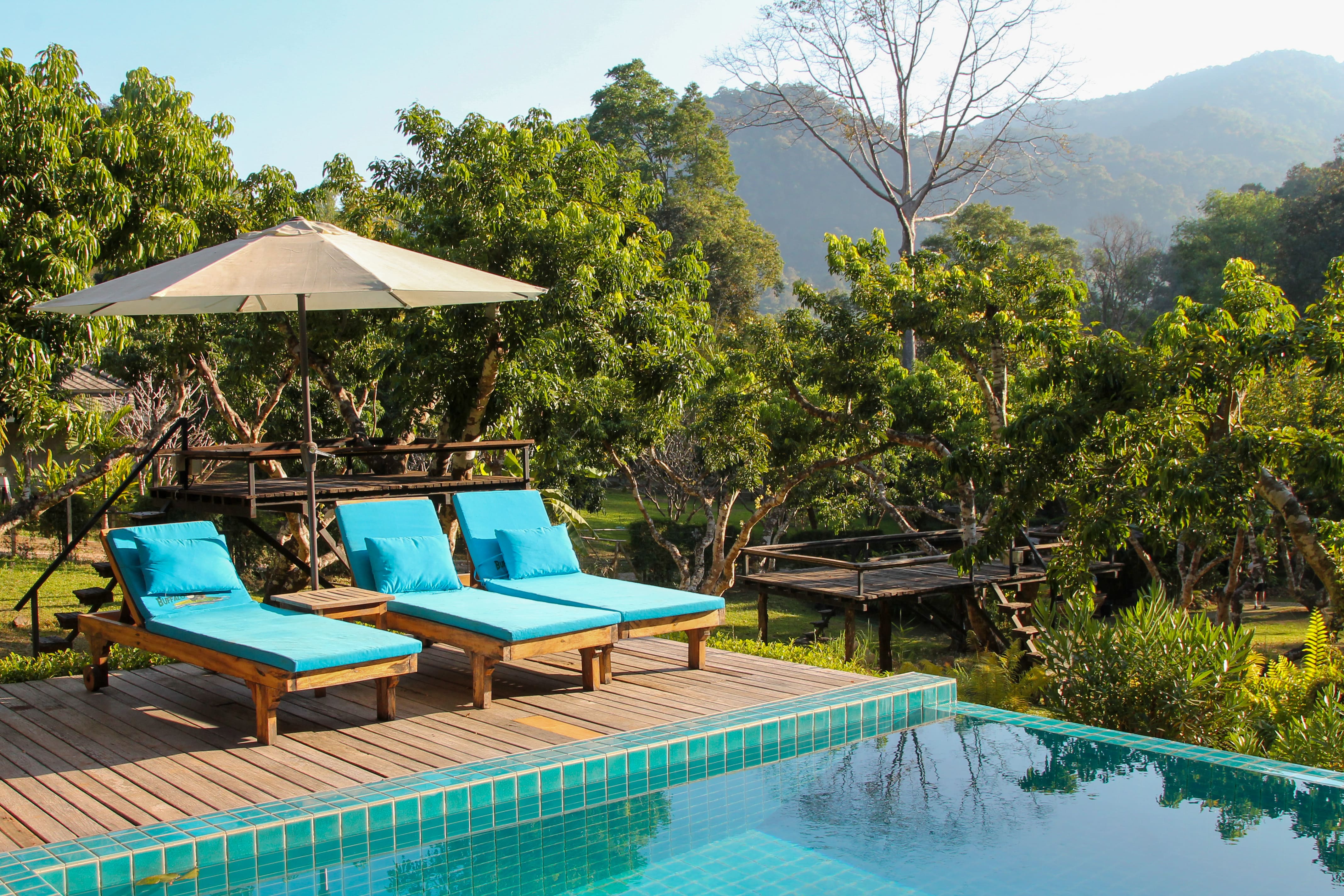 Infinity pool and valley view at the river camp