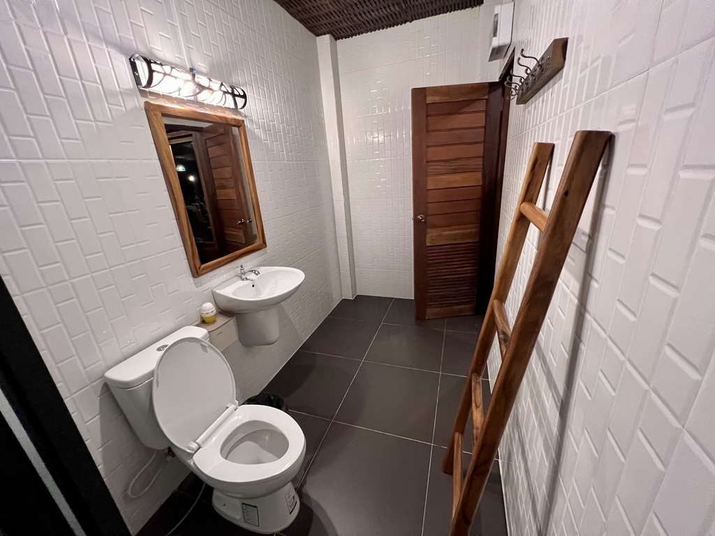 Villa bathroom — sink, dressing mirror and hot water